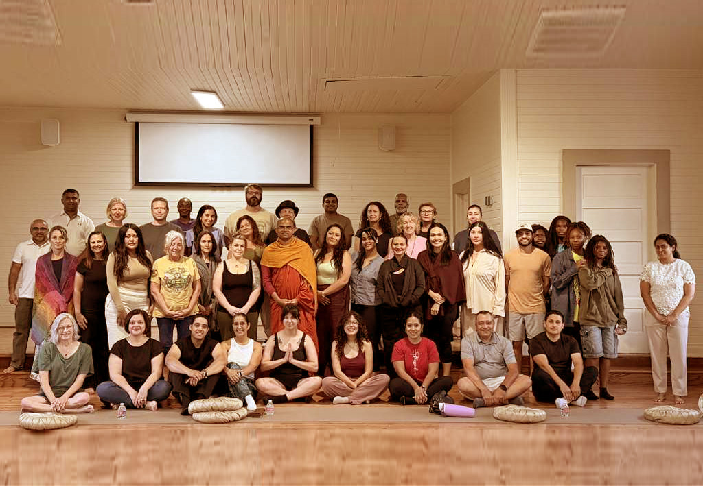 Participants meditating in hall