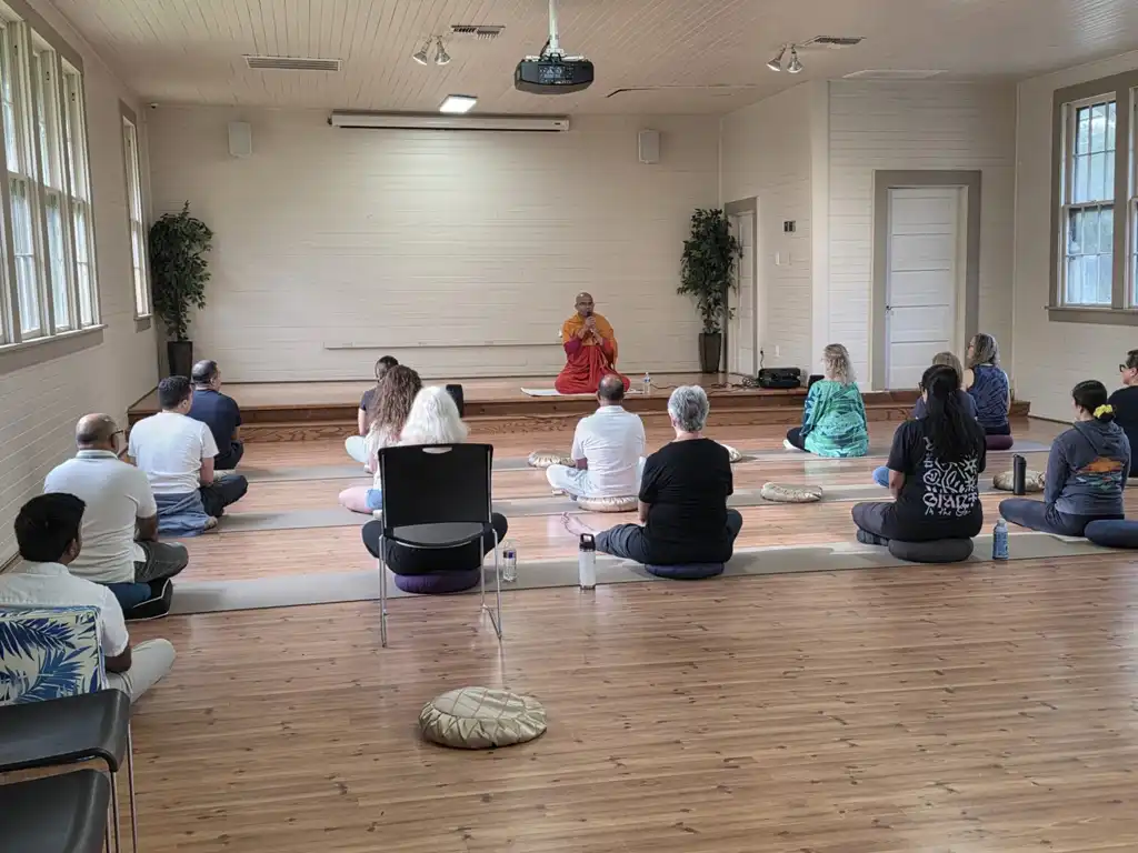 Meditation hall session with Buddhist monk